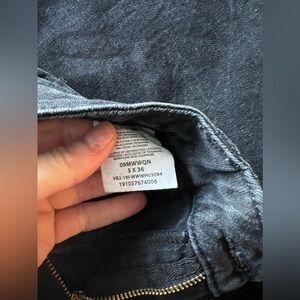 Black wrangler trousers